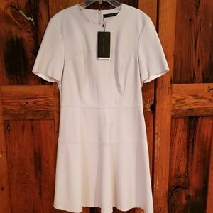 Creme faux-leather fit/flare dress